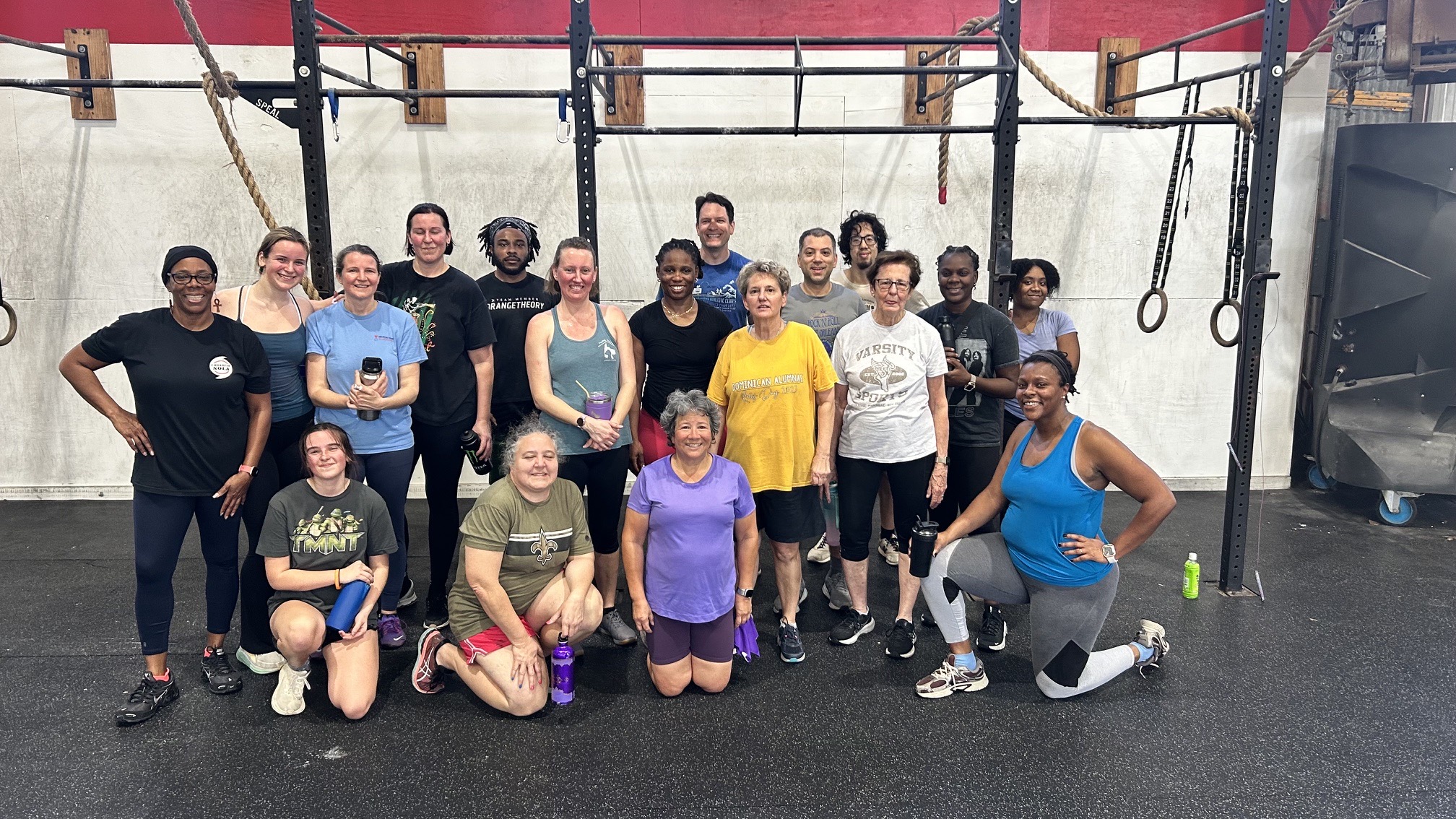 A group of New Orleans neighbors of all ages together after a fitness class