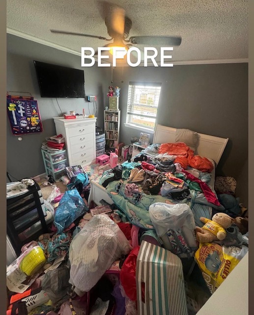 A cluttered bedroom before organizing